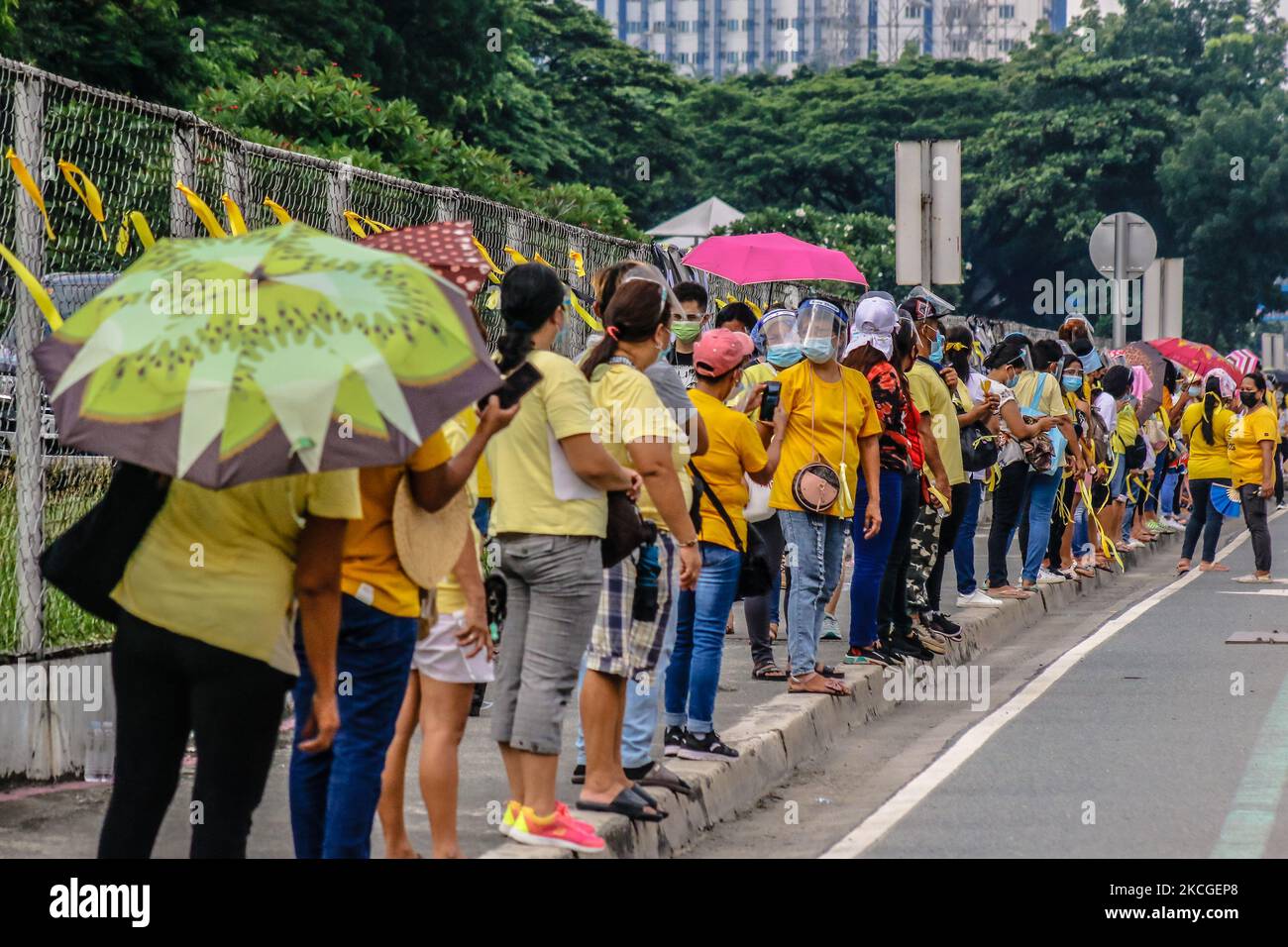 Supporters of Former President of the Philippines Benigno 'Noynoy' Aquino III are waiting in line to pay their respect to his ashes brought in Ateneo De Manila University in Quezon City, Philippines on June 25, 2021. Former President Benigno Aquino III publicly known as PNoy, peacefully died last Thursday morning, June 24, 2021 at the age of 61 because of Renal Disease. (Photo by Ryan Eduard Benaid/NurPhoto) Stock Photo