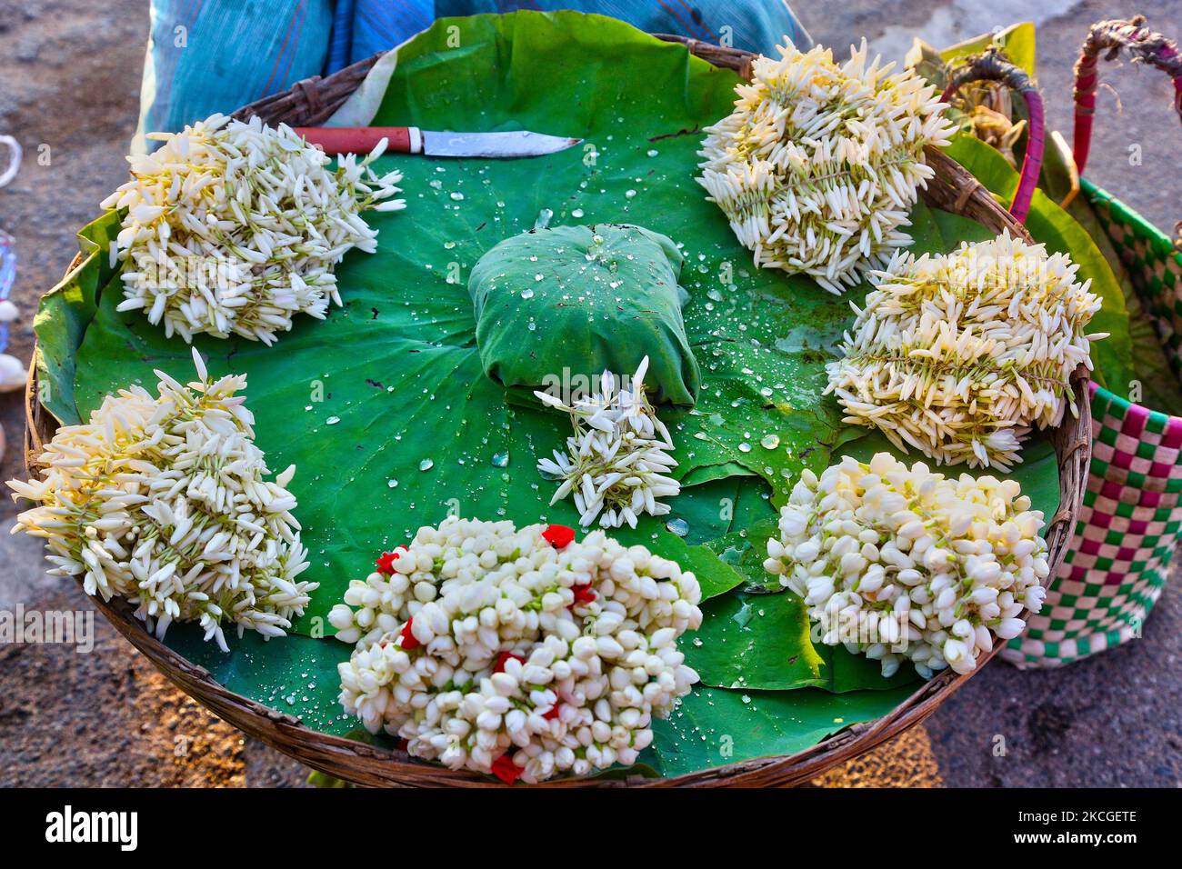Strings of jasmine flowers (used by women to adorn their hair) for sale