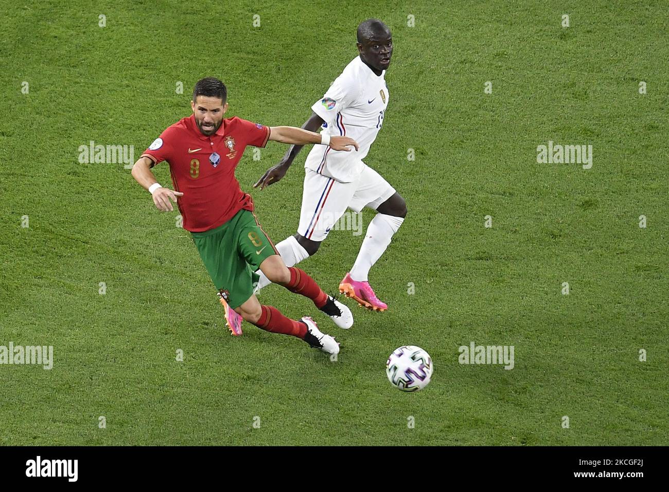 Joao Moutinho of Portugal battles for possession with N'Golo Kante of France during the UEFA European Championship 2020 football match between Portugal and France at Stadium Puskas Ferenc on June 23, 2021 in Budapest, Hungary. (Photo by Alex Nicodim/NurPhoto) Stock Photo