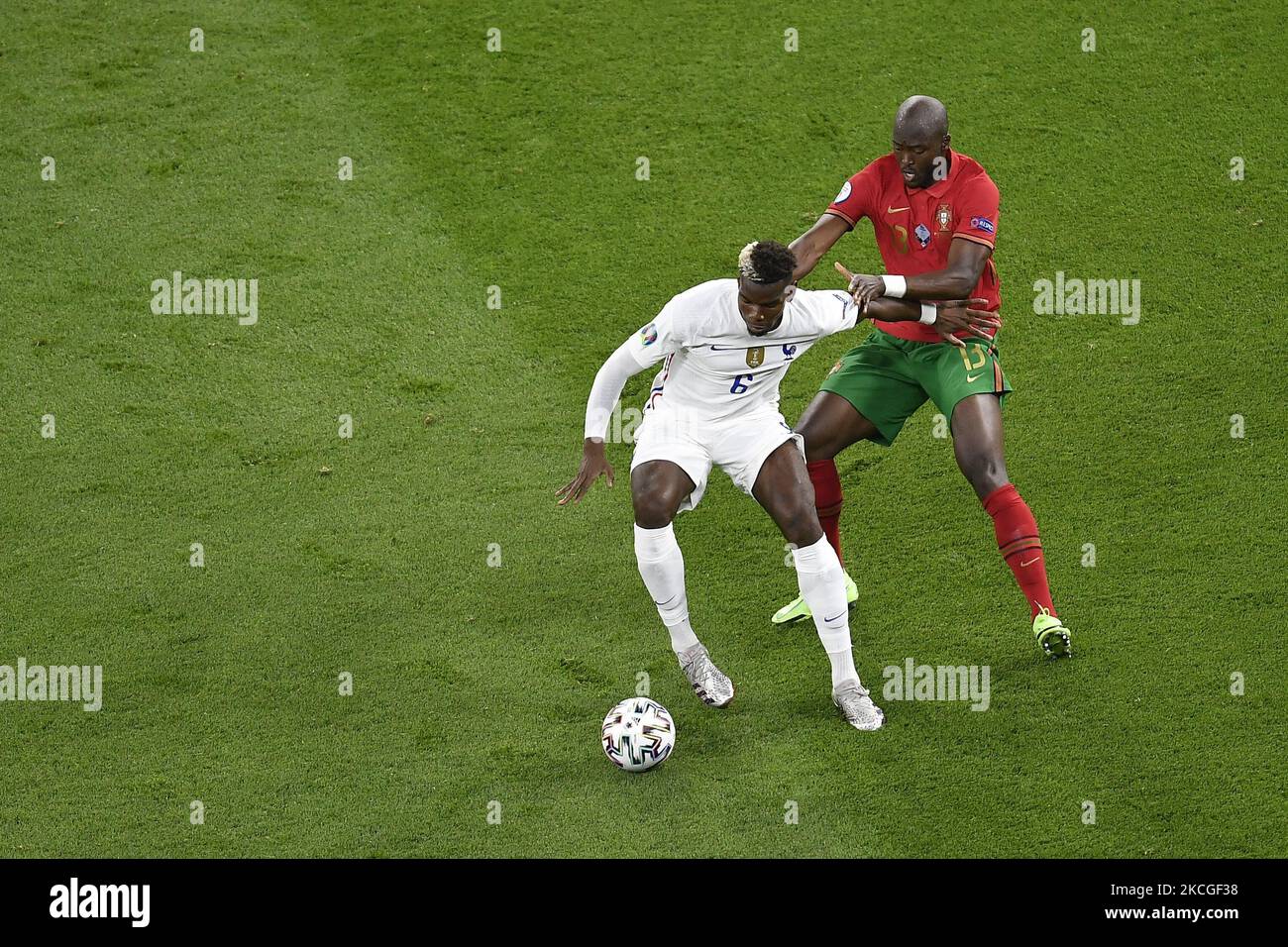 France's Paul Pogba and Portugal's Danilo Pereira fight for the ball during the UEFA European Championship 2020 football match between Portugal and France at Stadium Puskas Ferenc on June 23, 2021 in Budapest, Hungary. (Photo by Alex Nicodim/NurPhoto) Stock Photo