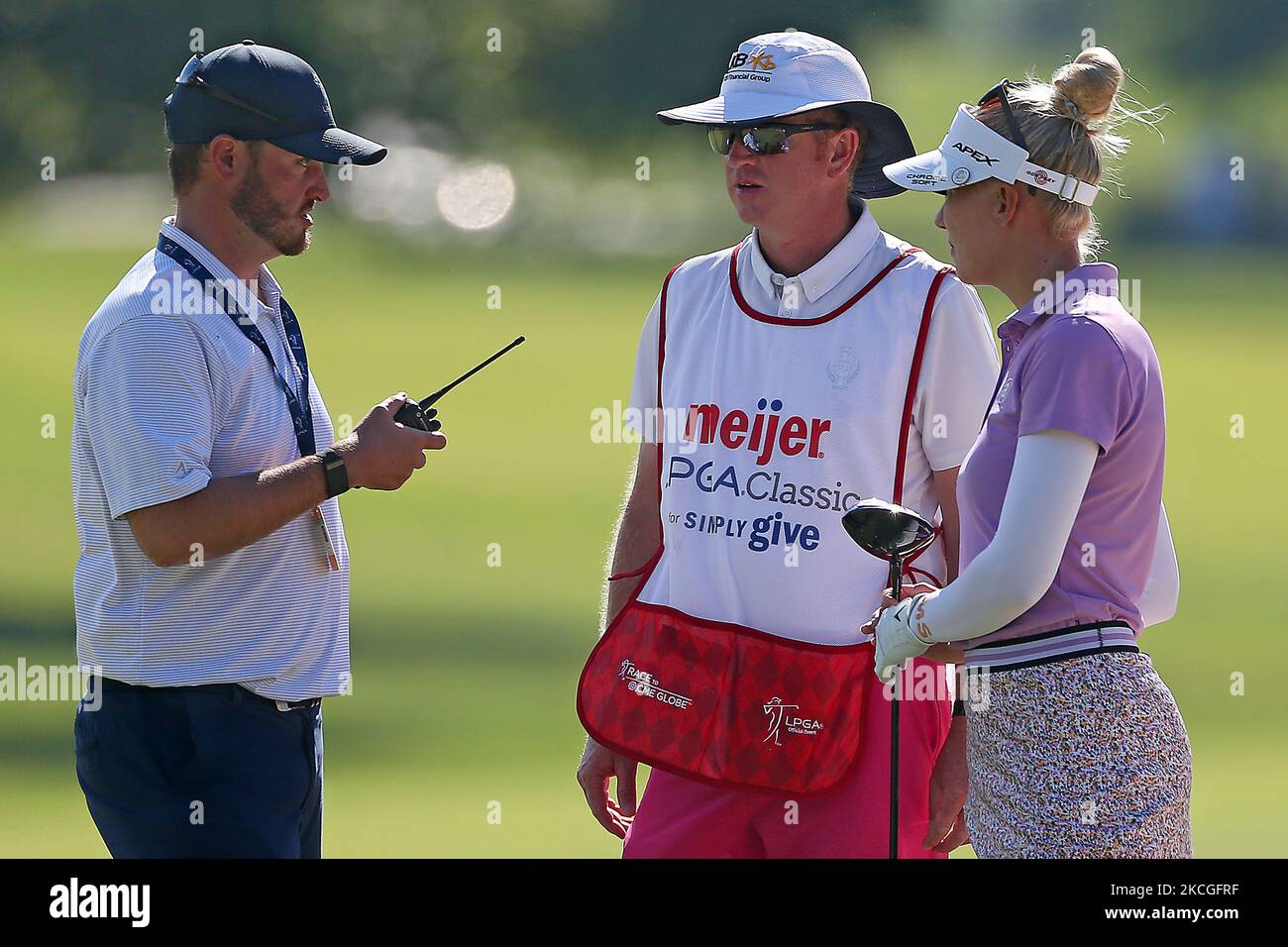 Madelene Sagstrom of Enkoping, Sweden reviews the ball embedded into