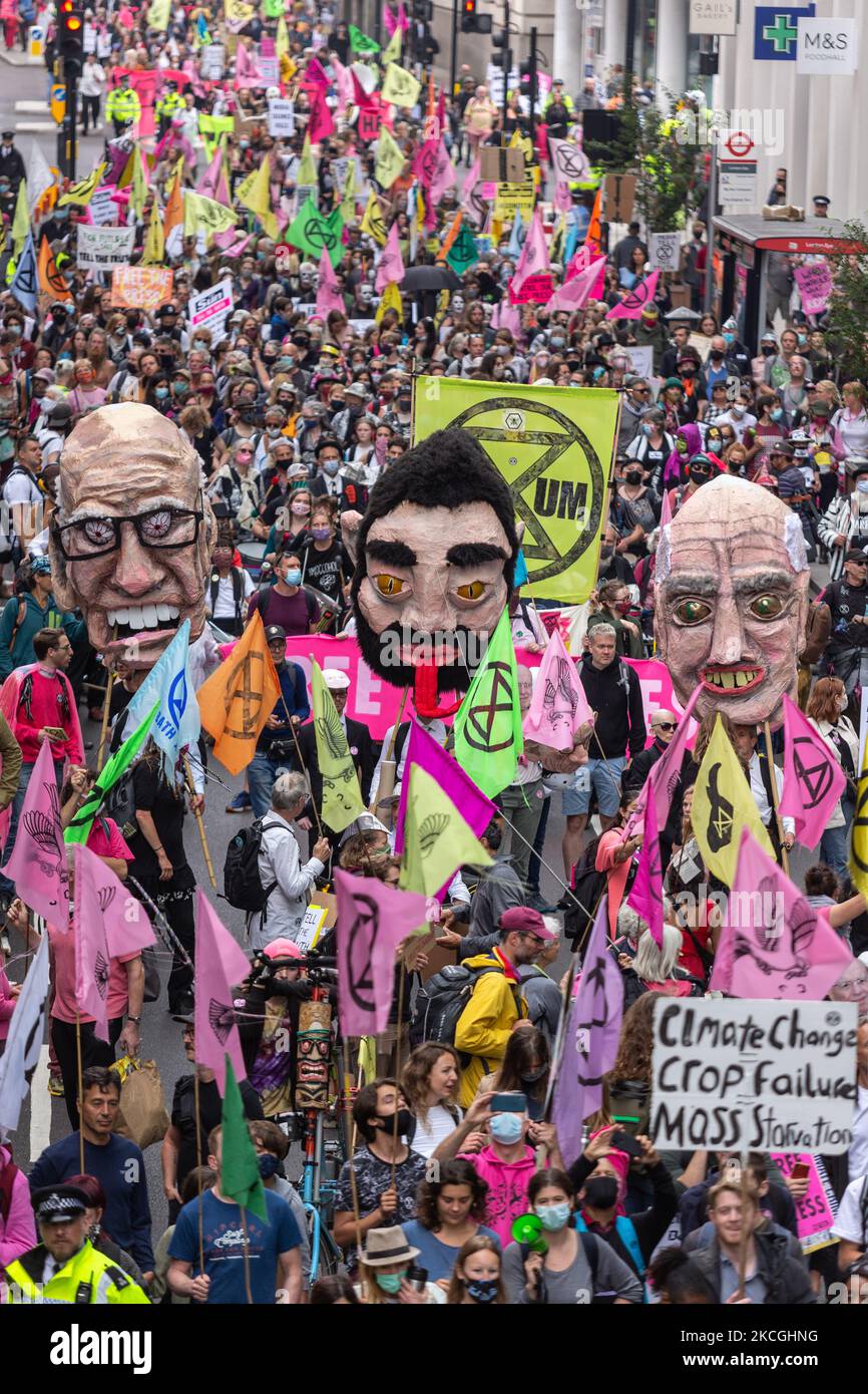 Extinction Rebellion activists march at Southbank during a Free the Press protest on June 27, 2021 in London, England. The Climate Change action group rally against the perceived control of the UK Media by just four powerful billionaires. (Photo by Dominika Zarzycka/NurPhoto) Stock Photo