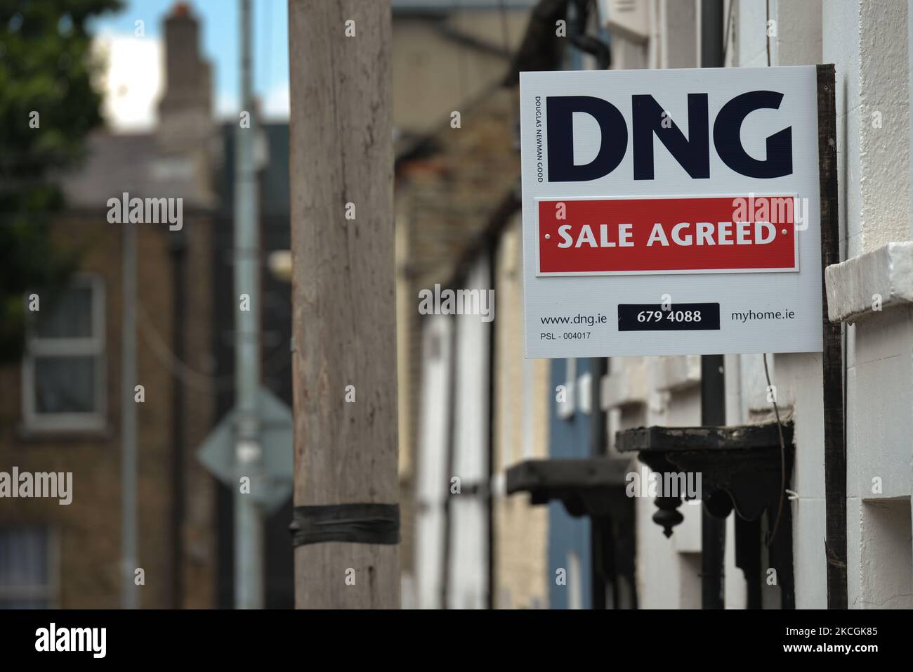Sign 'SALE AGREED' seen in front of a building in Dublin city center