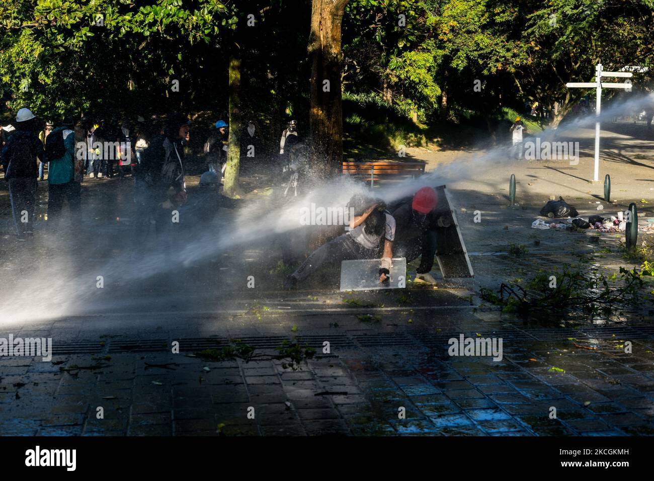 Demonstrators are sprayed with water cannons by the riot police during a protest against the government in Medellin, Colombia, on June 28, 2021. Some people injured by police shoots with no letal guns. (Photo by Santiago Botero/NurPhoto) Stock Photo