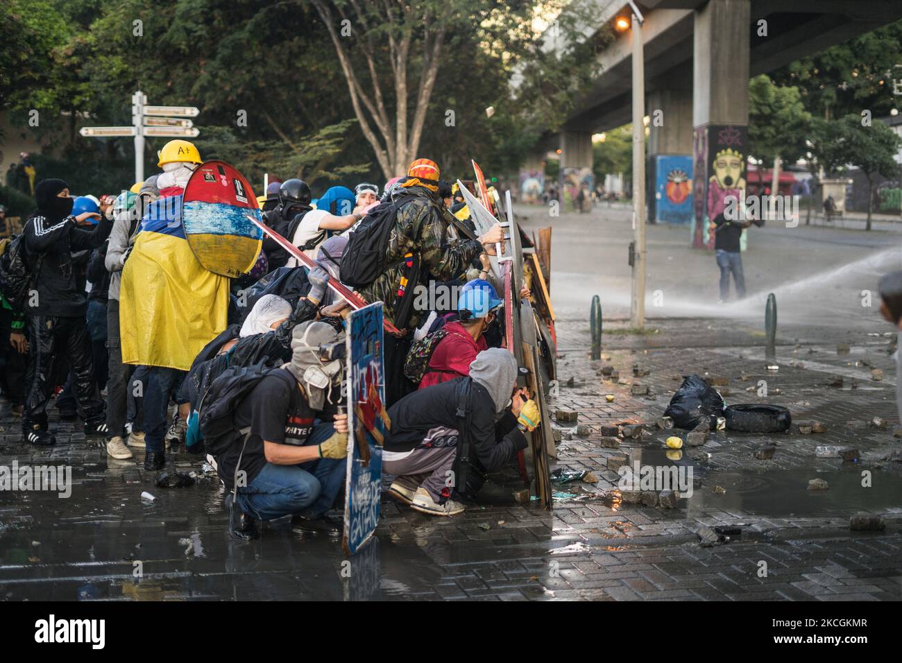 Demonstrators clash with riot police during a protest against the government in Medellin, Colombia, on June 28, 2021. Some people injured by police shoots with no letal guns. (Photo by Santiago Botero/NurPhoto) Stock Photo