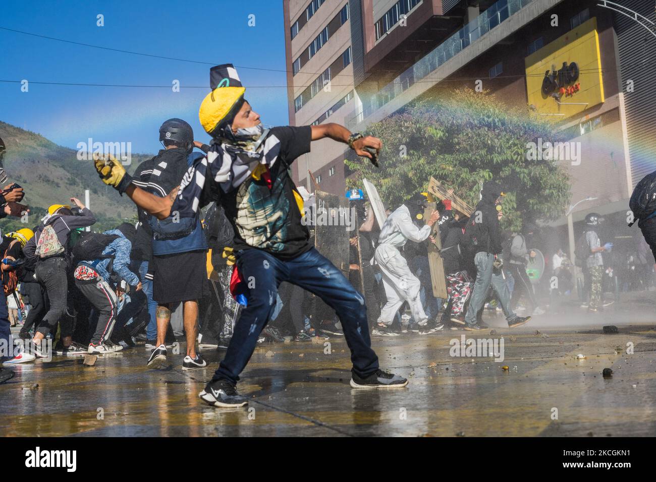 Demonstrators are sprayed with water cannons by the riot police during a protest against the government in Medellin, Colombia, on June 28, 2021. Some people injured by police shoots with no letal guns. (Photo by Santiago Botero/NurPhoto) Stock Photo