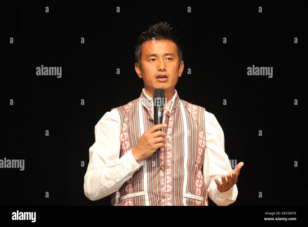 Baichung Bhutia the former captain of the Indian football (soccer) team speaks during the first ever Himalayan Ethnic Lepcha Fashion Show held in Gangtok, Sikkim, India, on November 10, 2012. Bhutia is considered to be the torchbearer of Indian football in the international arena, and is nicknamed the Sikkimese Sniper because of his shooting skills in football. Bhutia has had four spells at I-League football team East Bengal Club, the club where he started his career. When he signed up to play for the English club Bury in 1999, he became the first Indian footballer to play professional footbal Stock Photo