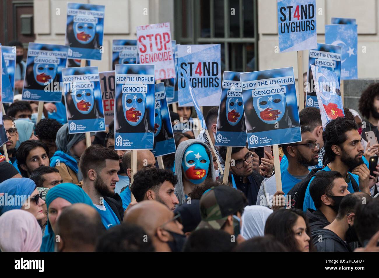 LONDON, UNITED KINGDOM - JULY 01, 2021: Protesters demonstrate in front of the Chinese Embassy in support of the repressed Uyghur Muslim community who live in Xinjiang in northwest China on the 100th anniversary of the founding of the Chinese Communist Party on July 01, 2021 in London, England. (Photo by WIktor Szymanowicz/NurPhoto) Stock Photo