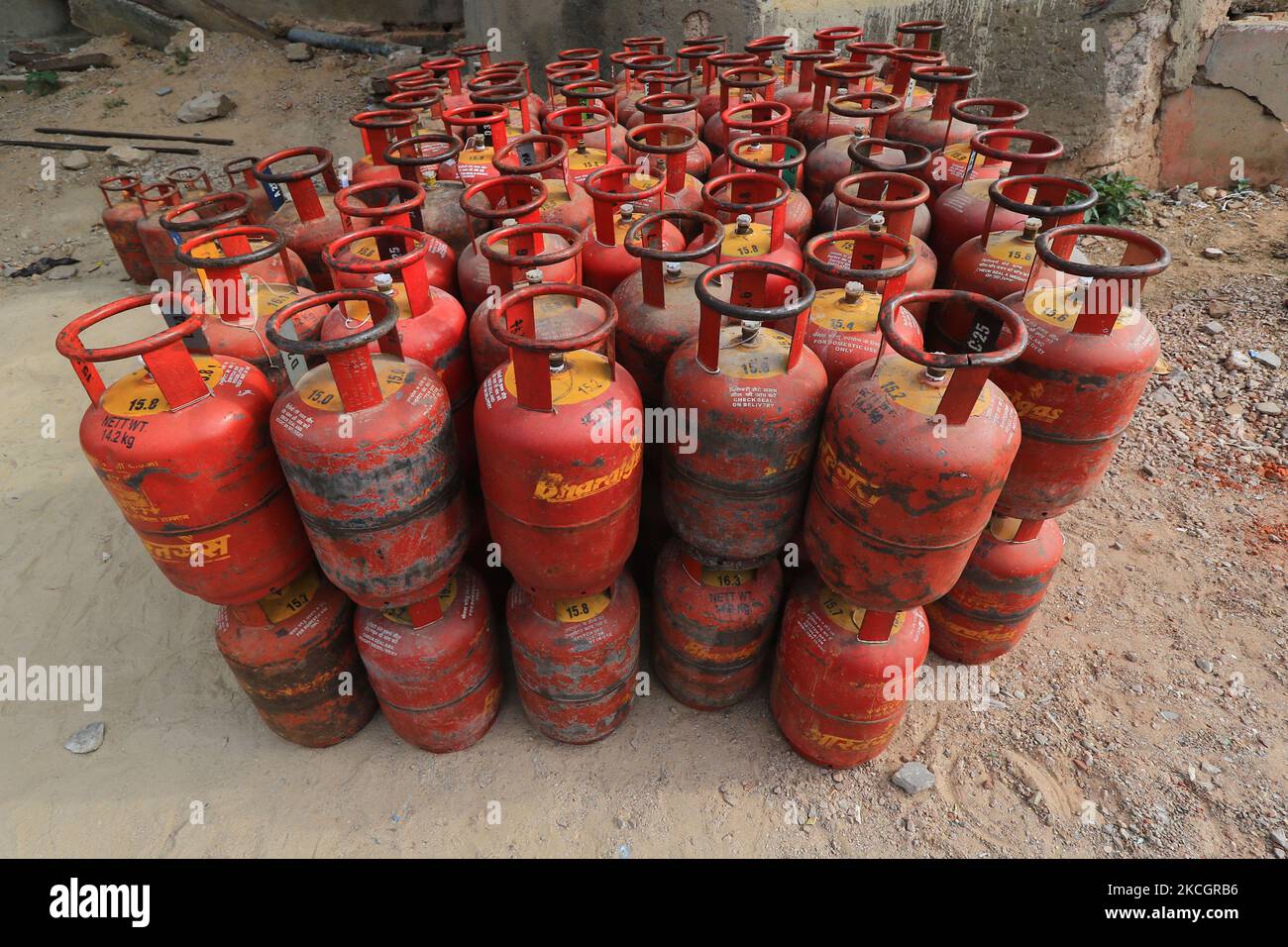 LPG gas cylinders unloaded from a truck, in Jaipur, Rajasthan, India, on July 2, 2021. The price of non-subsidised LPG cylinders hiked by Rs 25.50 and commercial LPG cylinders hiked by Rs 84. (Photo by Vishal Bhatnagar/NurPhoto) Stock Photo
