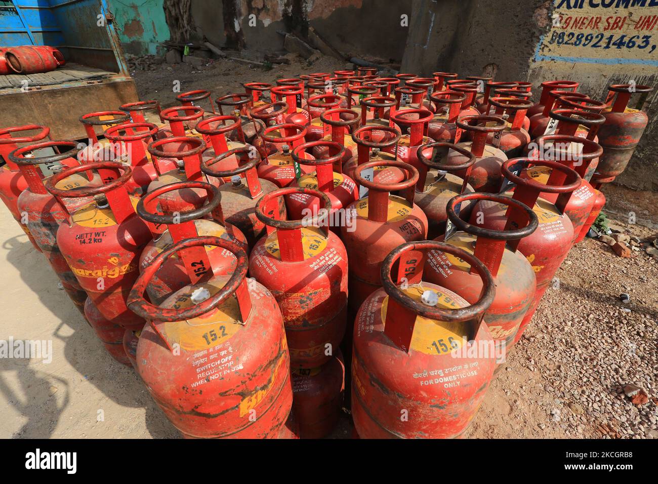 LPG gas cylinders unloaded from a truck, in Jaipur, Rajasthan, India, on July 2, 2021. The price of non-subsidised LPG cylinders hiked by Rs 25.50 and commercial LPG cylinders hiked by Rs 84. (Photo by Vishal Bhatnagar/NurPhoto) Stock Photo