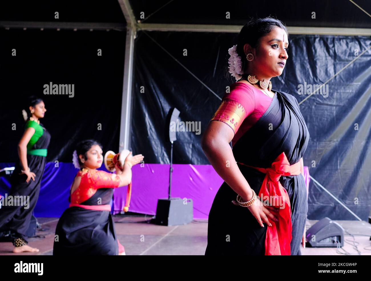 Tamil dancers during the Rojbin festival in Creteil, France, on July 3, 2021. The 4th edition of the Rojbin festival, created by the Kurdish women's movement in Europe and dedicated to activist Fidan Dogan, this year it was dedicated to the fight against feminicides and fascism. .(Photo by Vincent Koebel/NurPhoto) Stock Photo