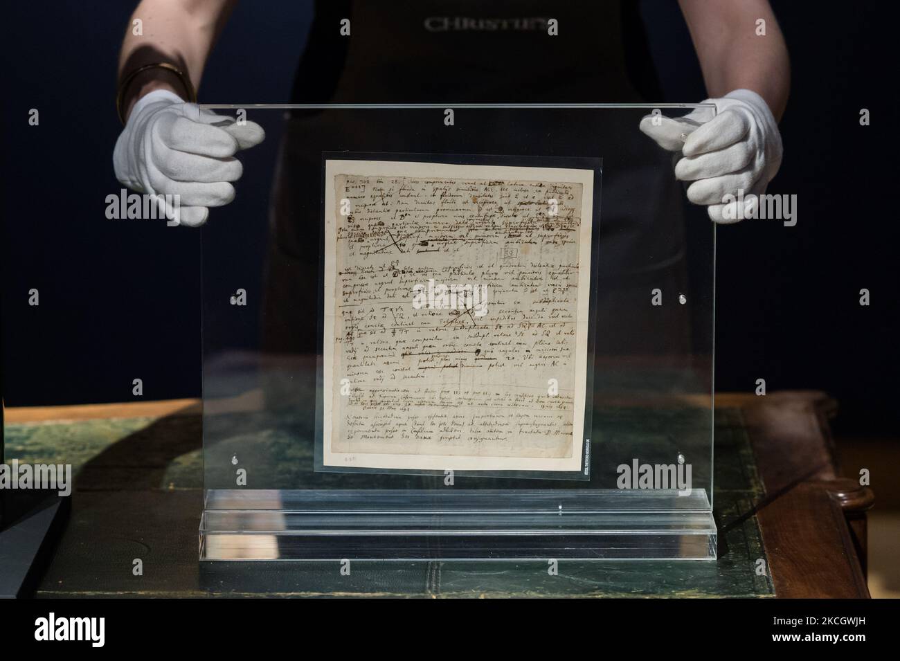 LONDON, UNITED KINGDOM - JULY 05, 2021: Isaac Newton’s 'Philosophiae naturalis principia mathematica' working manuscript for second edition, estimate £600,000-900,000 is displayed during a photo call for Classic Week at Christie's auction house, a marquee series of nine auctions which feature works of art from antiquity to the 20th century on July 05, 2021 in London, England. (Photo by WIktor Szymanowicz/NurPhoto) Stock Photo