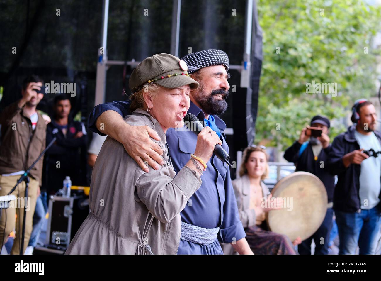 Sivan Perwer and Berivan Firat during the defend kurdistan concert in Paris, France, on July 4, 2021. On the weekend of July 3 and 4, Kurdish organizations around the world applied to denounce the Turkish aggression in Iraqi Kurdistan. In Paris, a demonstration and a concert were held to denounce the Turkish military intervention. (Photo by Vincent Koebel/NurPhoto) Stock Photo