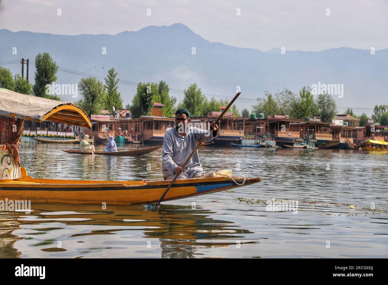 https://c8.alamy.com/comp/2KCGXGJ/tourists-enjoy-shikara-ride-in-famous-dal-lake-in-srinagar-jammu-and-kashmir-india-on-06-july-2021-photo-by-nasir-kachroonurphoto-2KCGXGJ.jpg