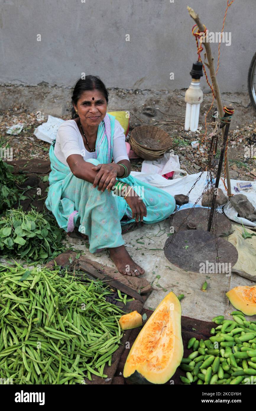 Merchant at the Shaniwaar Subzi Bazaar, which is the largest fruit and vegetable market in the Indian city of Nagpur, Maharashtra, India. (Photo by Creative Touch Imaging Ltd./NurPhoto) Stock Photo