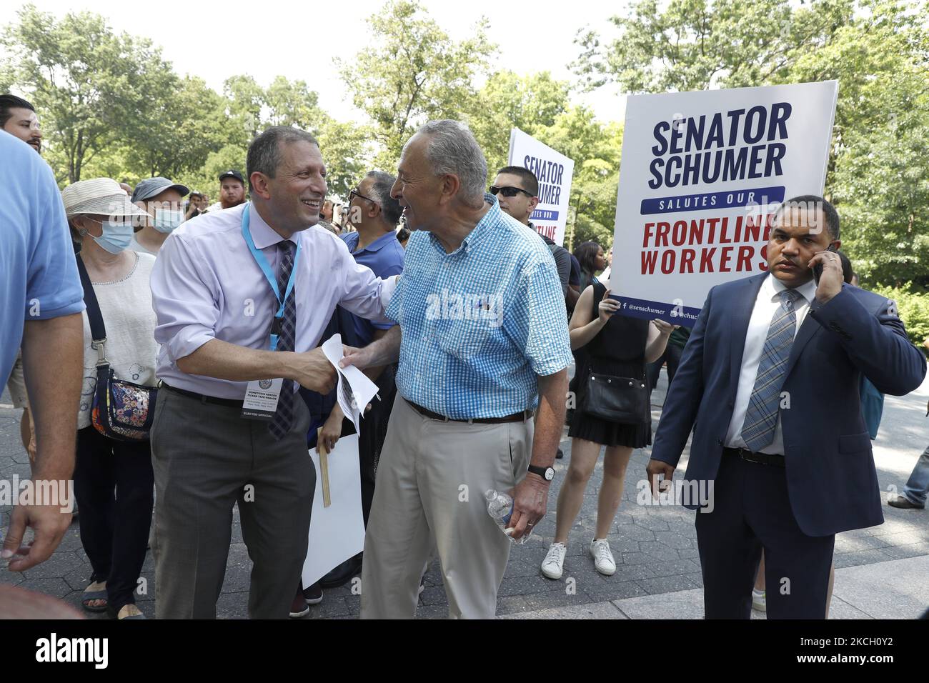 Senator Chuck Schumer (D-NY) greets people as hundreds of first ...
