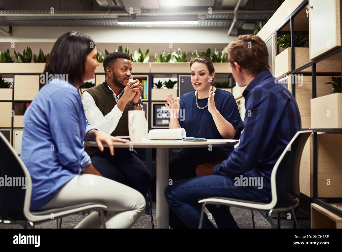 It all starts with small ideas. a group of designers having a meeting ...