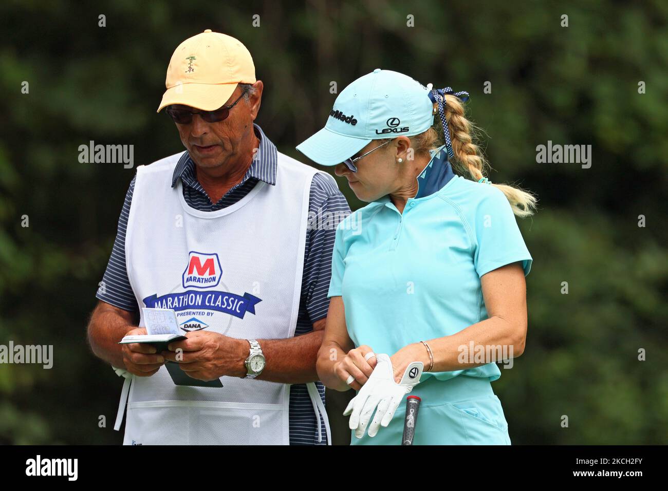 Natalie Gulbis of Lake Las Vegas, Virginia talks with her caddy before hitting from the 11th tee during the second round of the Marathon LPGA Classic golf tournament at Highland Meadows Golf Club in Sylvania, Ohio, USA Friday, July 9, 2021. (Photo by Amy Lemus/NurPhoto) Stock Photo