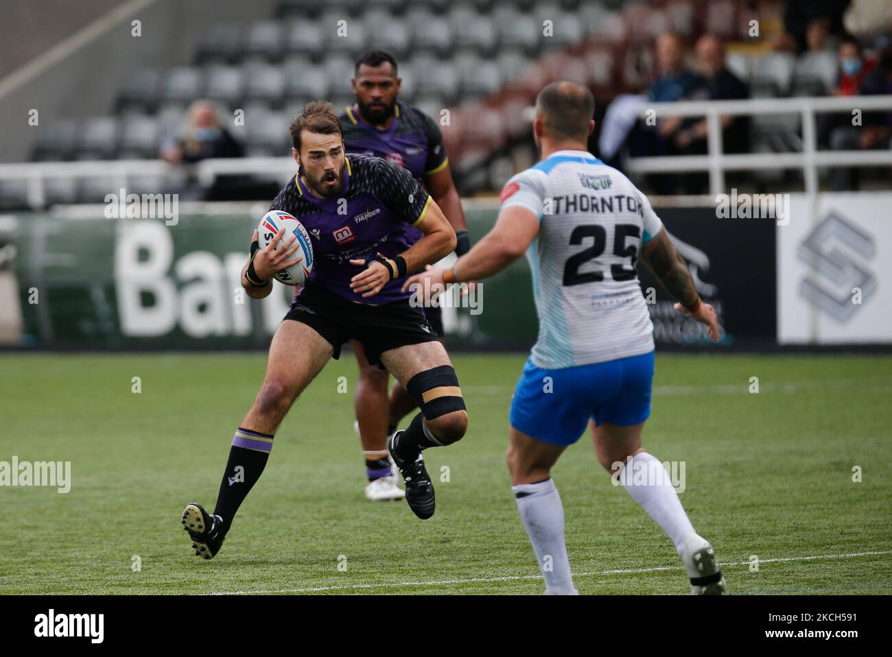 Jay Chapelhow of Newcastle Thunder takes on James Thornton of Dewsbury Rams during the BETFRED Championship match between Newcastle Thunder and Dewsbury Rams at Kingston Park, Newcastle on Sunday 11th July 2021. (Photo by Chris Lishman/MI News/NurPhoto) Stock Photo