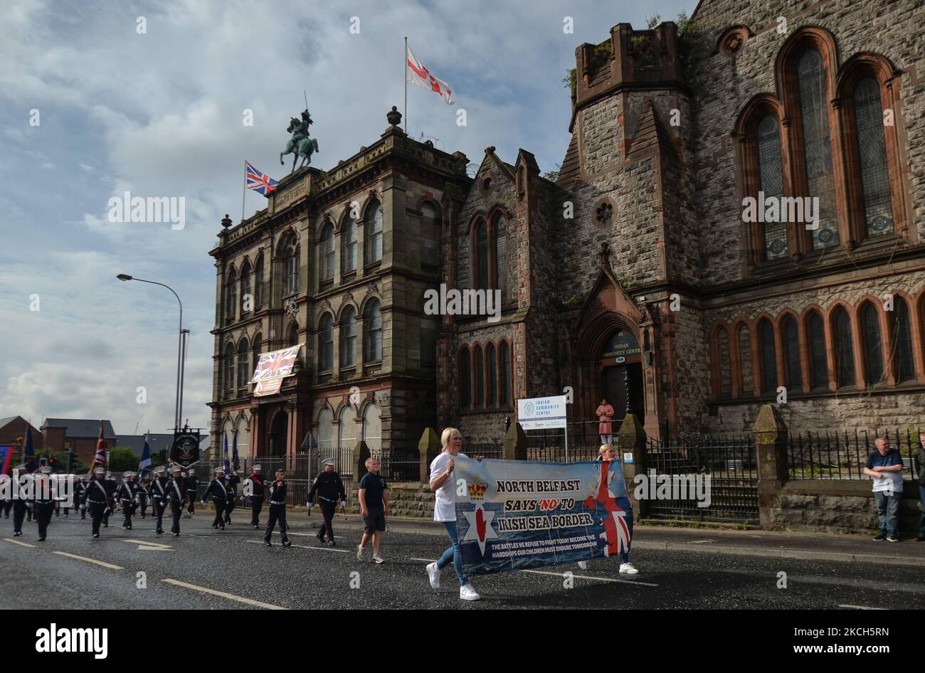 Members of the Orange Order and their supporters take part in the