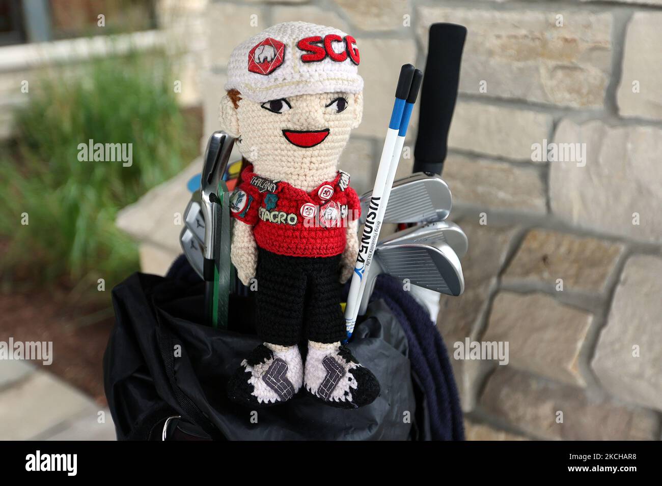 A crocheted club cover in the bag of Ariya Jutanugarn is seen at the entrance of the clubhouse during the third round of the Dow Great Lakes Bay Invitational at Midland Country Club in Midland, Michigan, on Friday, July 16, 2021. (Photo by Amy Lemus/NurPhoto) Stock Photo