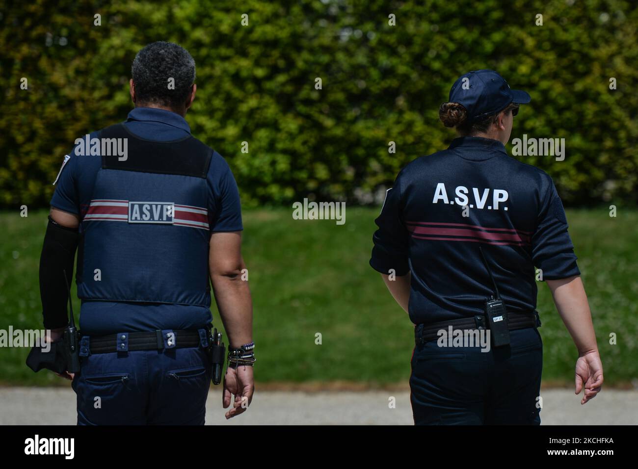 Members of the local city police patrolling in the city center of Caen with ASVP marks on their backs (A.S.V.P. - agent de surveillance de la voie publique in French). On Wednesday, July 20, 2021, in Caen, Calvados, Normandy, France. (Photo by Artur Widak/NurPhoto) Stock Photo