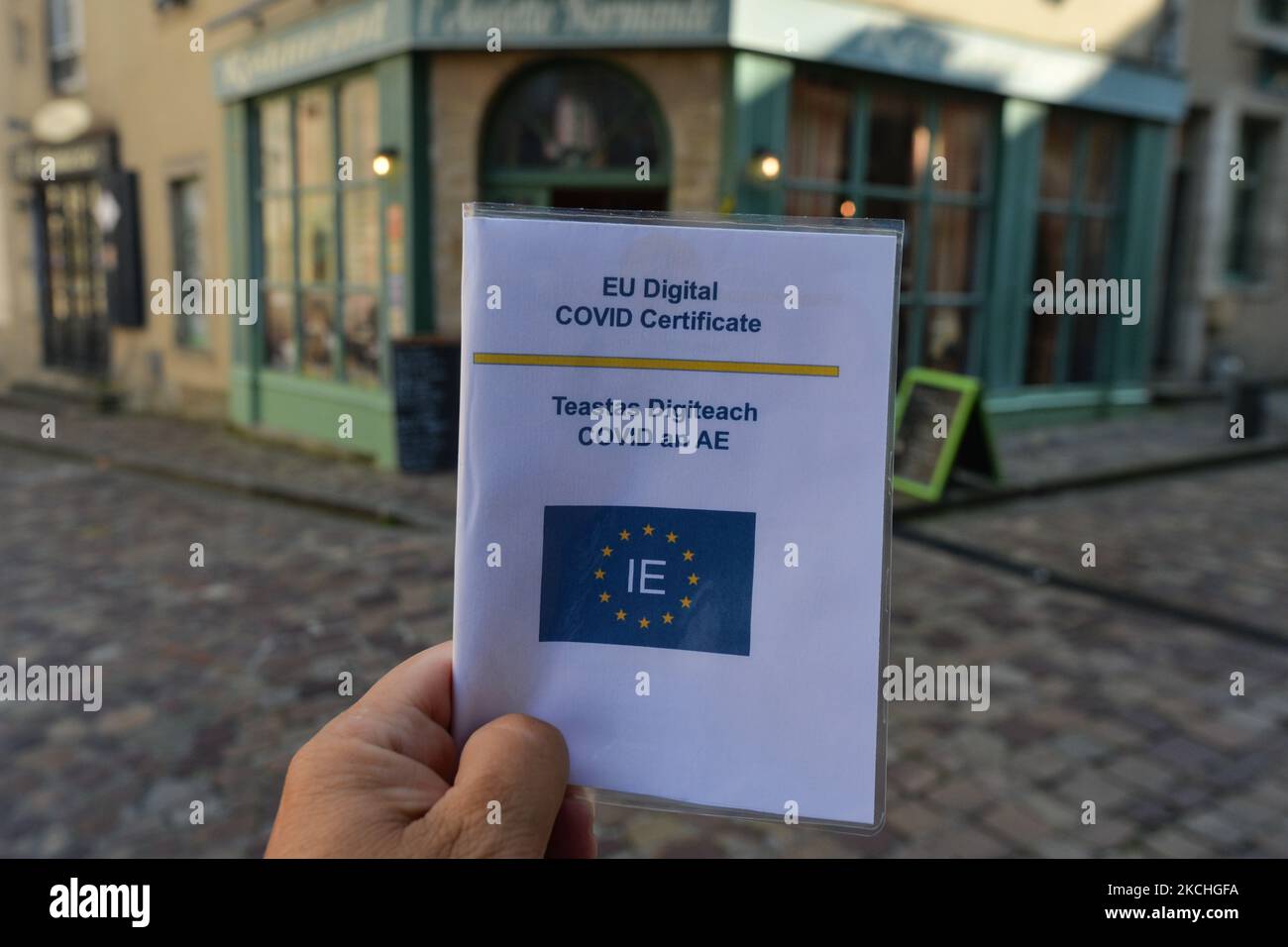 EU COVID digital certificate (Irish vesion) displayed in front of a restaurant in Bayeux. On Wednesday, July 21, 2021, in Bayeux, Calvados, Normandy, France. (Photo by Artur Widak/NurPhoto) Stock Photo