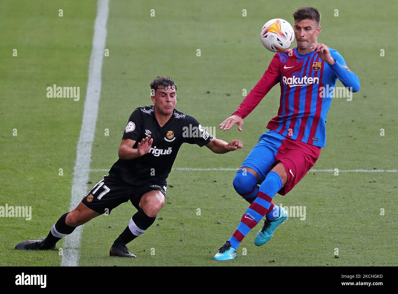 Gerard Pique and Prats during the friendly match between FC Barcelona and Club Gimnastic de Tarragona, played at the Johan Cruyff Stadium on 21th July 2021, in Barcelona, Spain. (Photo by Joan Valls/ Urbanandsport /NurPhoto) Stock Photo