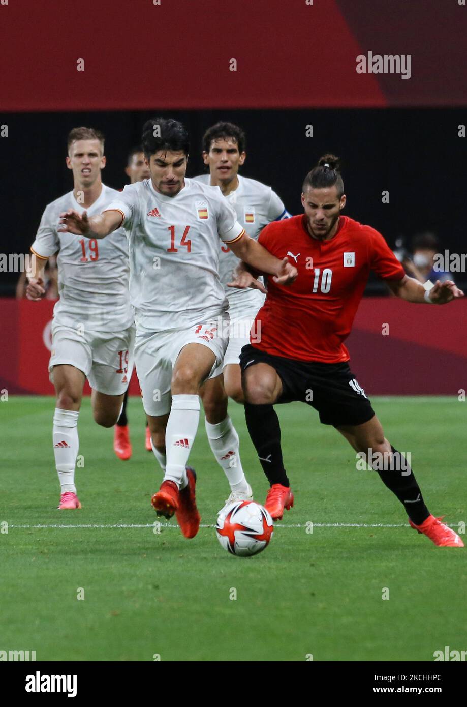 (10) Ramadan SOBHI of Team Egypt battles for possession with (14) Carlos SOLER of Team Spain during the Men's First Round Group C match between Egypt and Spain during the Tokyo 2020 Olympic Games at Sapporo Dome Stadium 22 July 2021 (Photo by Ayman Aref/NurPhoto) Stock Photo