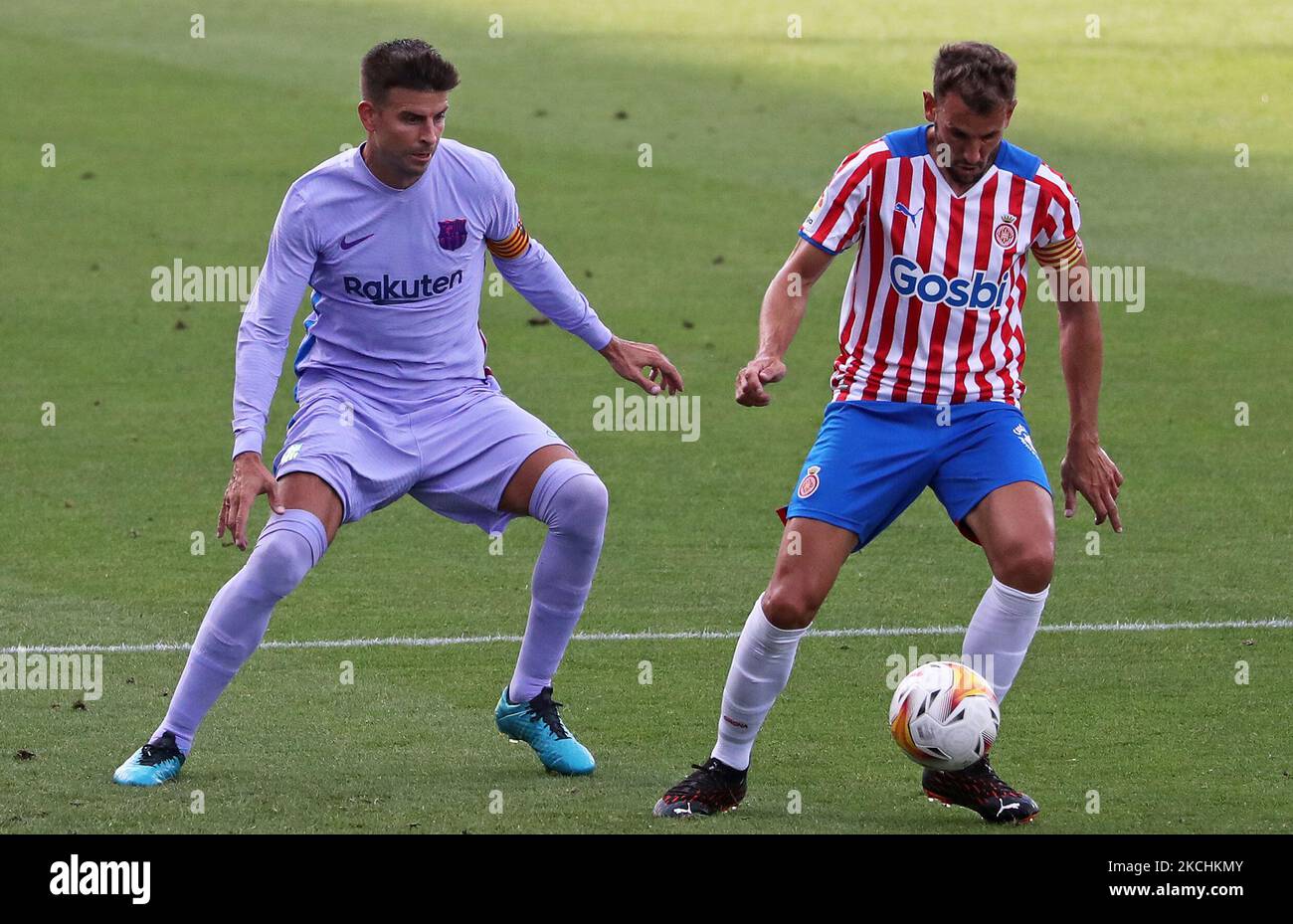 Christian Stuani and Gerard Pique during the friendly match between FC Barcelona and Girona FC, played at the Johan Cruyff Stadium on 24th July 2021, in Barcelona, Spain. (Photo by Joan Valls/Urbanandsport/NurPhoto) Stock Photo