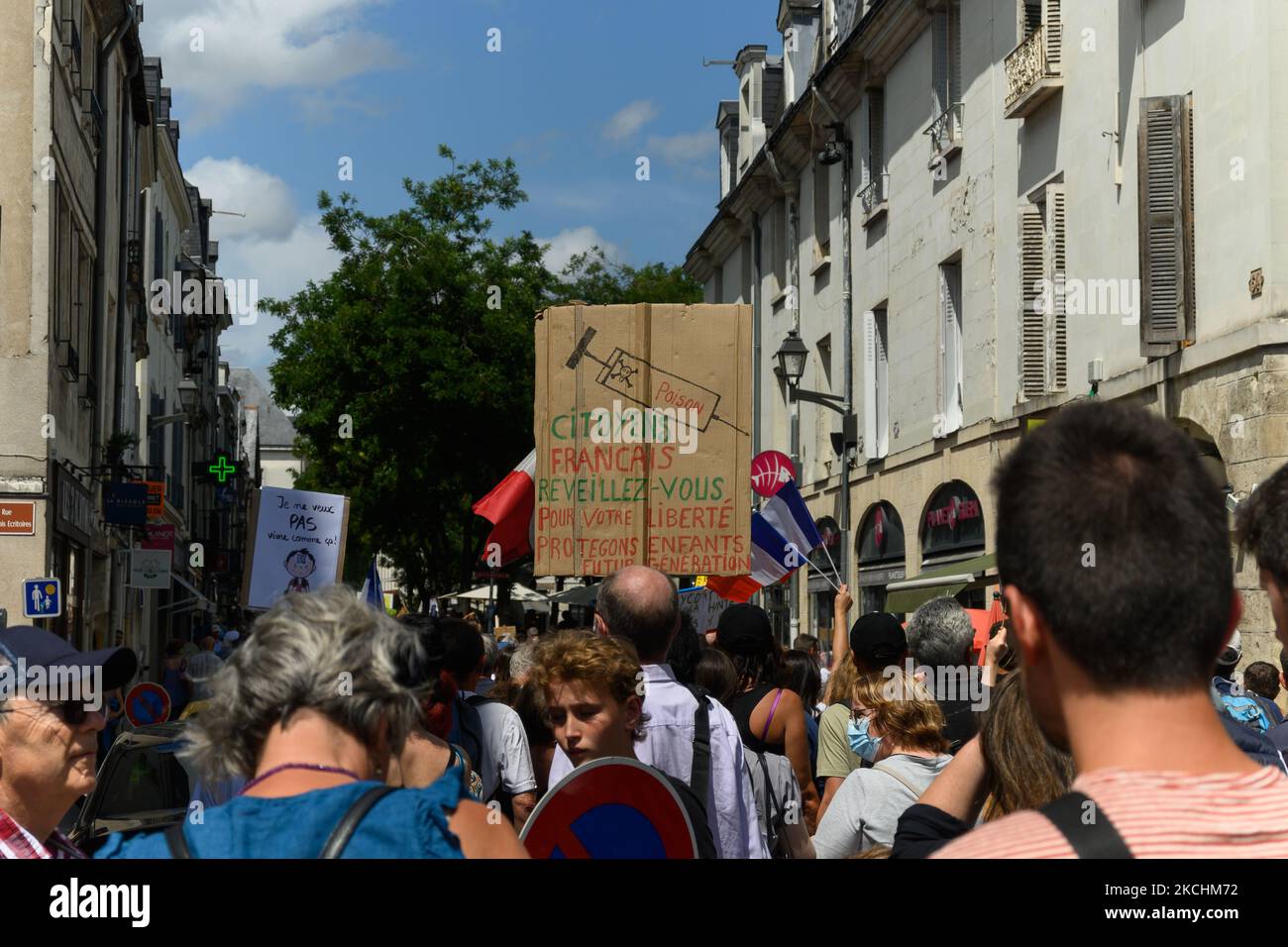 Thousands of people gathered on July 24th, in Tours, France against the mandatory vaccination, and the ''Health Pass'' (''Pass Sanitaire''), whose conditions were announced by Emmanuel Macron, in an address on July 12th. Many of those conditions were reviewed by the National Assembly and the Senate, and some of them ended up being deleted, which produced contestations. (Photo by Adrien Fillon/NurPhoto) Stock Photo