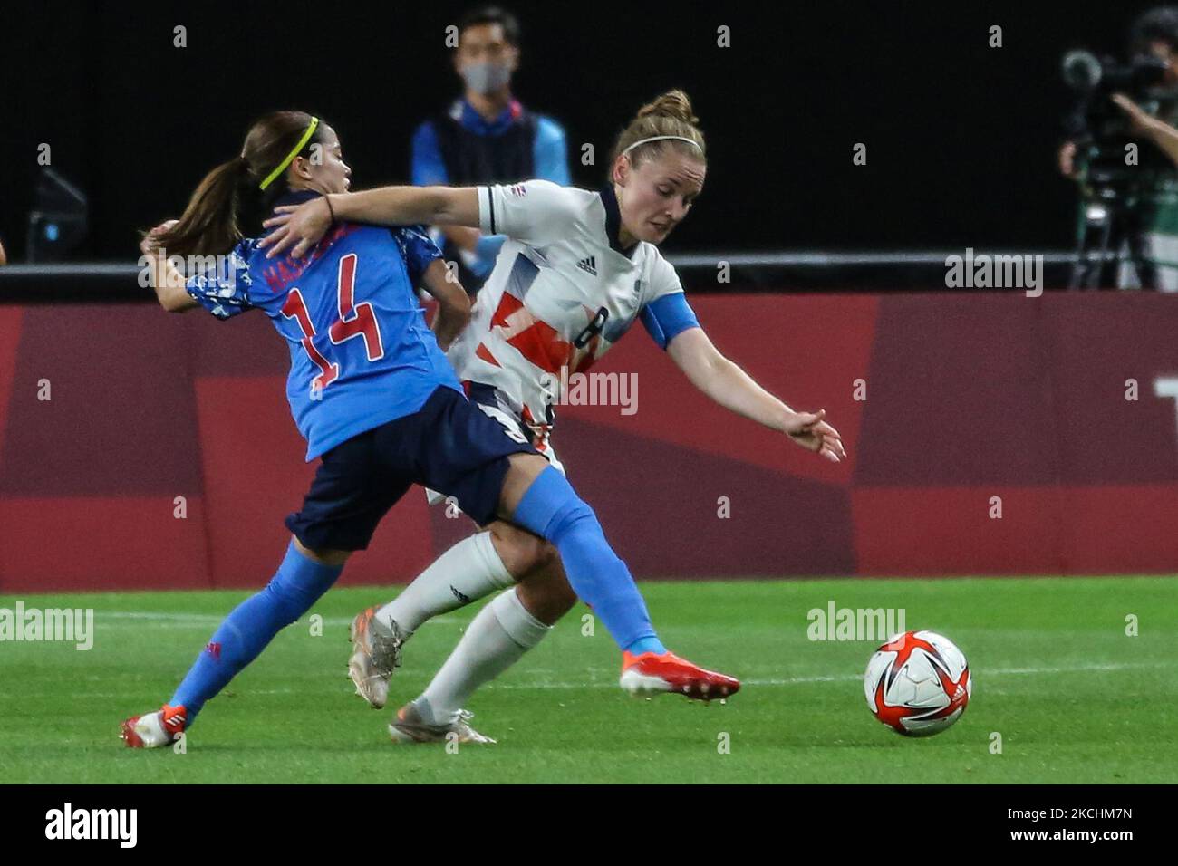(14) Yui HASEGAWA of Team Japan is challenged by (8) Kim LITTLE of Team Great Britain during the Women's First Round Group E match between Japan and Great Britain on day one of the Tokyo 2020 Olympic Games at Sapporo Dome Stadium (Photo by Ayman Aref/NurPhoto) Stock Photo