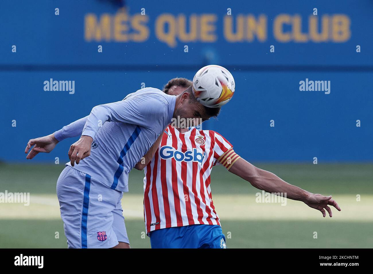 Gerard Pique of Barcelona and Cristhian Stuani of Girona compete for the ball during the pre-season friendly match between FC Barcelona and Girona FC at Estadi Johan Cruyff on July 24, 2021 in Barcelona, Spain. (Photo by Jose Breton/Pics Action/NurPhoto) Stock Photo