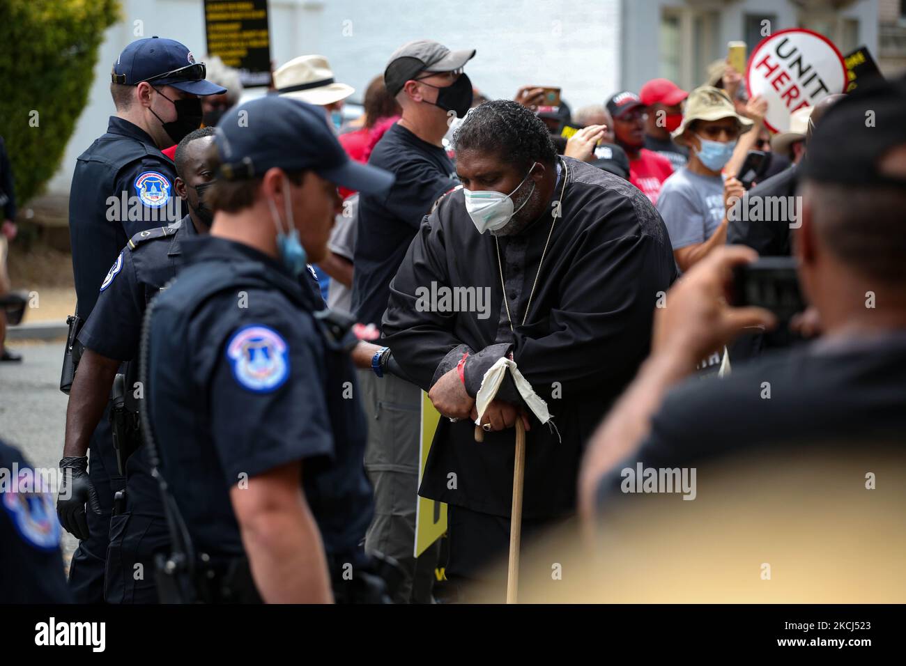 Reverend William Barber is arrested by U.S. Capitol Police during the Poor People's Campaign Moral Monday demonstration and civil disobedience action near the U.S. Capitol in Washington, D.C. on August 2, 2021 (Photo by Bryan Olin Dozier/NurPhoto) Stock Photo