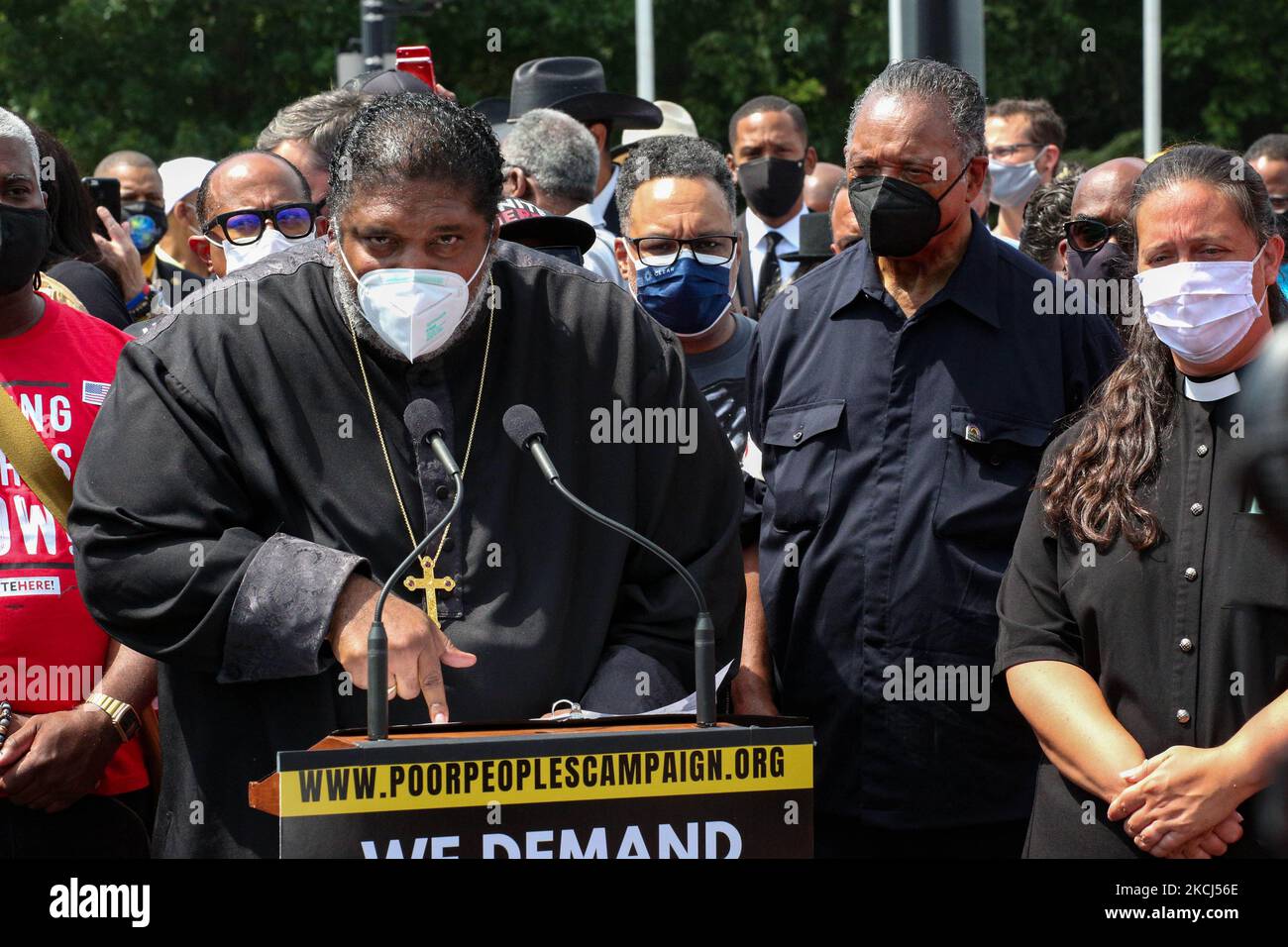 Reverend William Barber II speaks as Rev. Jesse Jackson, right, looks on at the Poor People's Campaign Moral Monday demonstration and civil disobedience action near the U.S. Capitol in Washington, D.C. on August 2, 2021 (Photo by Bryan Olin Dozier/NurPhoto) Stock Photo