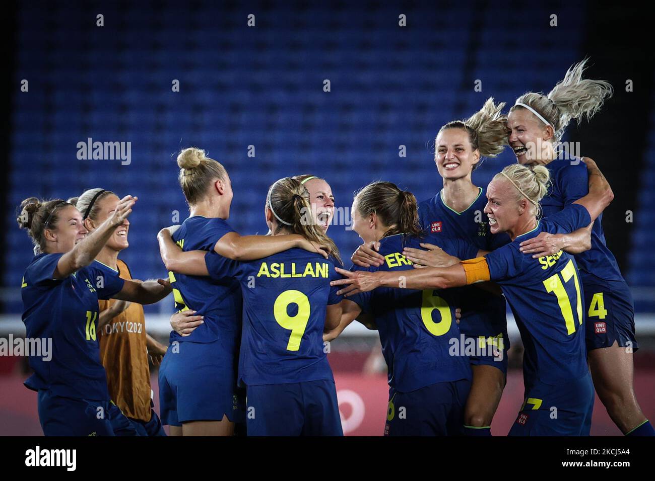 Players of Team Sweden celebrate the victory after the match between