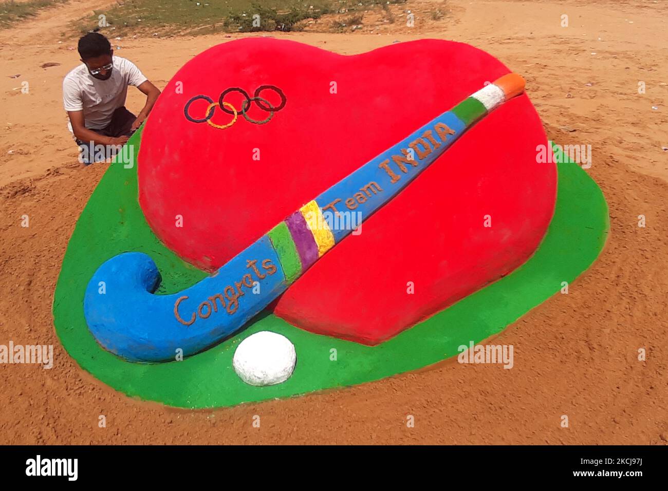 Indian Sand Artist Ajay Rawat Create a sand sculpture to Congratulate