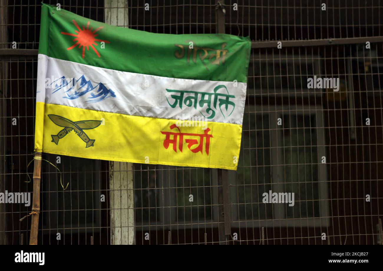 Gorkhaland flag hangs on a wire mesh gate as thousands of Nepalis filled the streets after a hartal (general strike) was called that shutdown the entire city of Darjeeling as well as the surrounding towns affecting the entire hill-station in Darjeeling, West Bengal, India, on May 30, 2010. The hartal was called after Madan Tamang, leader of the moderate group Akhil Bharatiya Gorkha League (ABGL) was stabbed to death allegedly by Gorkha Janmukti Morcha (GJM) supporters on May 21, 2010 in Darjeeling, which lead to a spontaneous shutdown of the three Darjeeling hill sub-divisions of Darjeeling, K Stock Photo