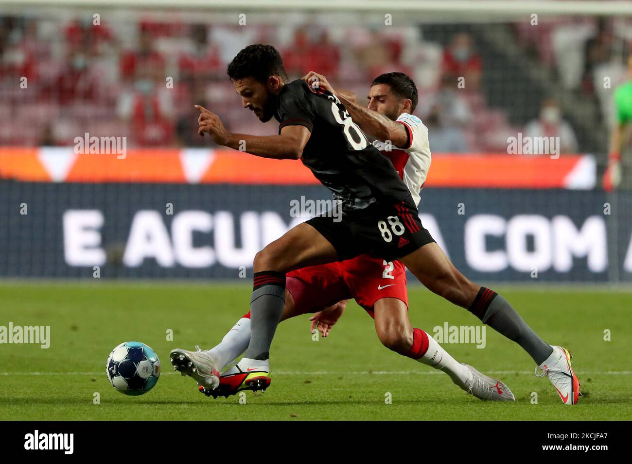 BUDAPEST, HUNGARY - AUGUST 13: (l-r) Tokmac Chol Nguen of Ferencvarosi TC  wins the ball from Arijan Ademi of GNK Dinamo Zagreb during the UEFA  Champions League Third Qualifying Round match between