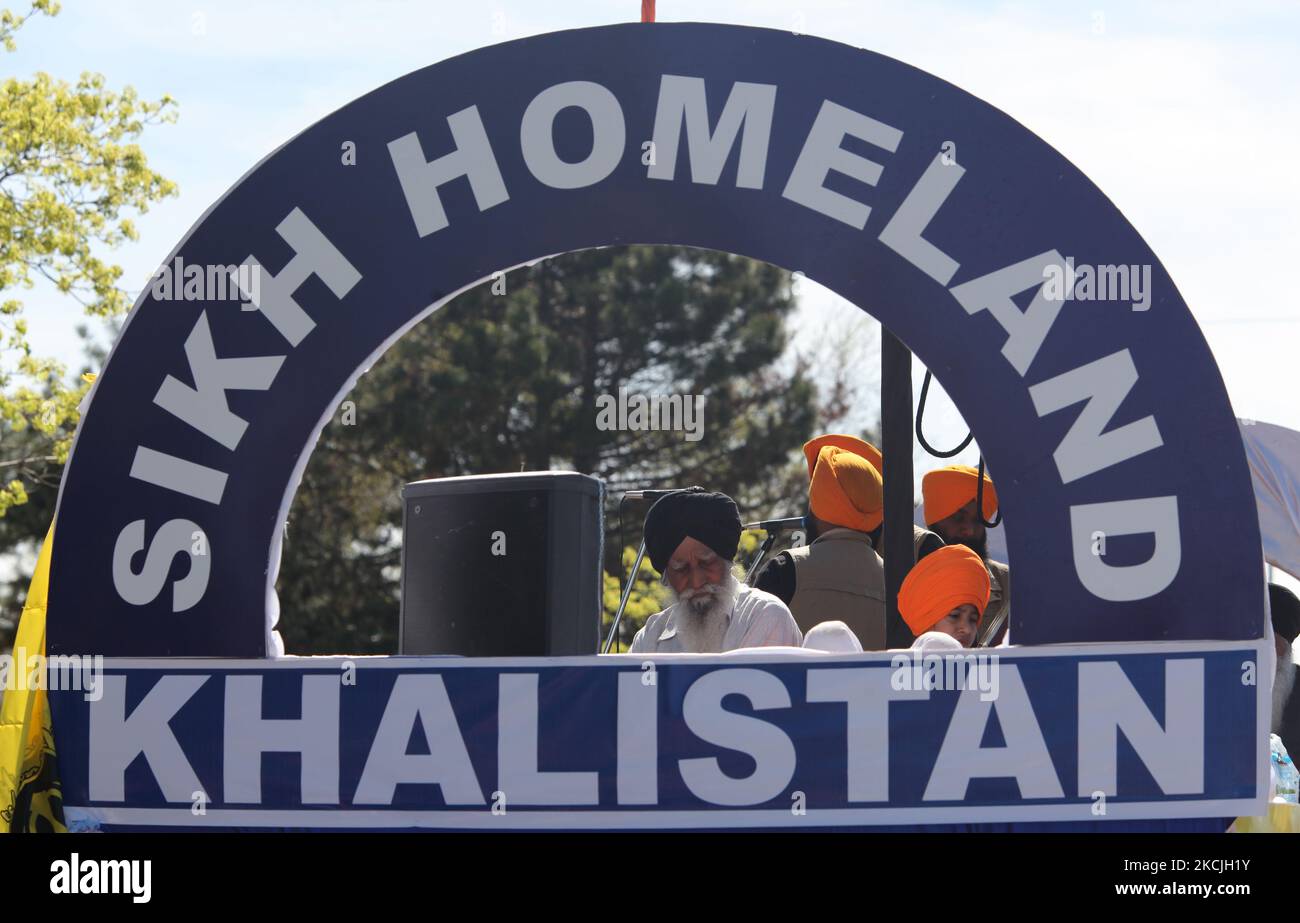 Canadian Pro-Khalistan Sikhs protest against the Indian government and call for a separate Sikh state called Khalistan in Malton, Ontario, Canada, on May 05, 2013. Thousands of Sikhs attended a Nagar Kirtan to celebrate Vaisakhi and to show their discontent with the Indian government. The Khalistan movement refers to a movement which seeks to create a separate Sikh state, called Khalistan in the Punjab region of India. The territorial definition of the proposed nation is disputed, with some believing it should be carved simply out of the Indian state of Punjab, where Sikhs are the majority pop Stock Photo