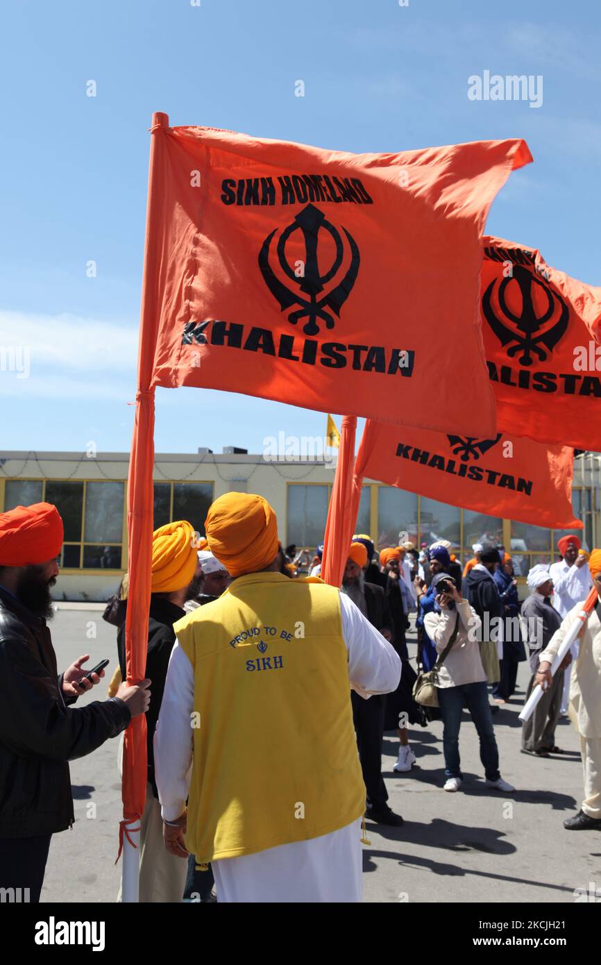 Canadian Pro-Khalistan Sikhs protest against the Indian government and call for a separate Sikh state called Khalistan in Malton, Ontario, Canada, on May 06, 2012. Thousands of Sikhs attended a Nagar Kirtan to celebrate Vaisakhi and to show their discontent with the Indian government. The Khalistan movement refers to a movement which seeks to create a separate Sikh state, called Khalistan in the Punjab region of India. The territorial definition of the proposed nation is disputed, with some believing it should be carved simply out of the Indian state of Punjab, where Sikhs are the majority pop Stock Photo