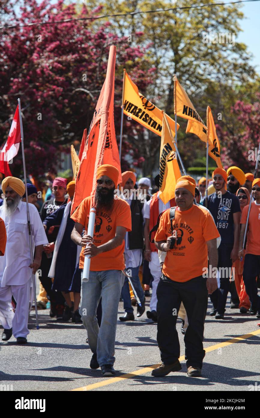 Canadian Pro-Khalistan Sikhs protest against the Indian government and call for a separate Sikh state called Khalistan in Malton, Ontario, Canada, on May 06, 2012. Thousands of Sikhs attended a Nagar Kirtan to celebrate Vaisakhi and to show their discontent with the Indian government. The Khalistan movement refers to a movement which seeks to create a separate Sikh state, called Khalistan in the Punjab region of India. The territorial definition of the proposed nation is disputed, with some believing it should be carved simply out of the Indian state of Punjab, where Sikhs are the majority pop Stock Photo