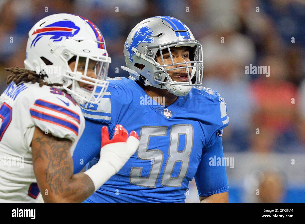 Detroit Lions offensive tackle Penei Sewell (58) blocks Miami Dolphins  linebacker Jaelan Phillips (15) during an NFL football game, Sunday, Oct.  30, 2022, in Detroit. (AP Photo/Rick Osentoski Stock Photo - Alamy