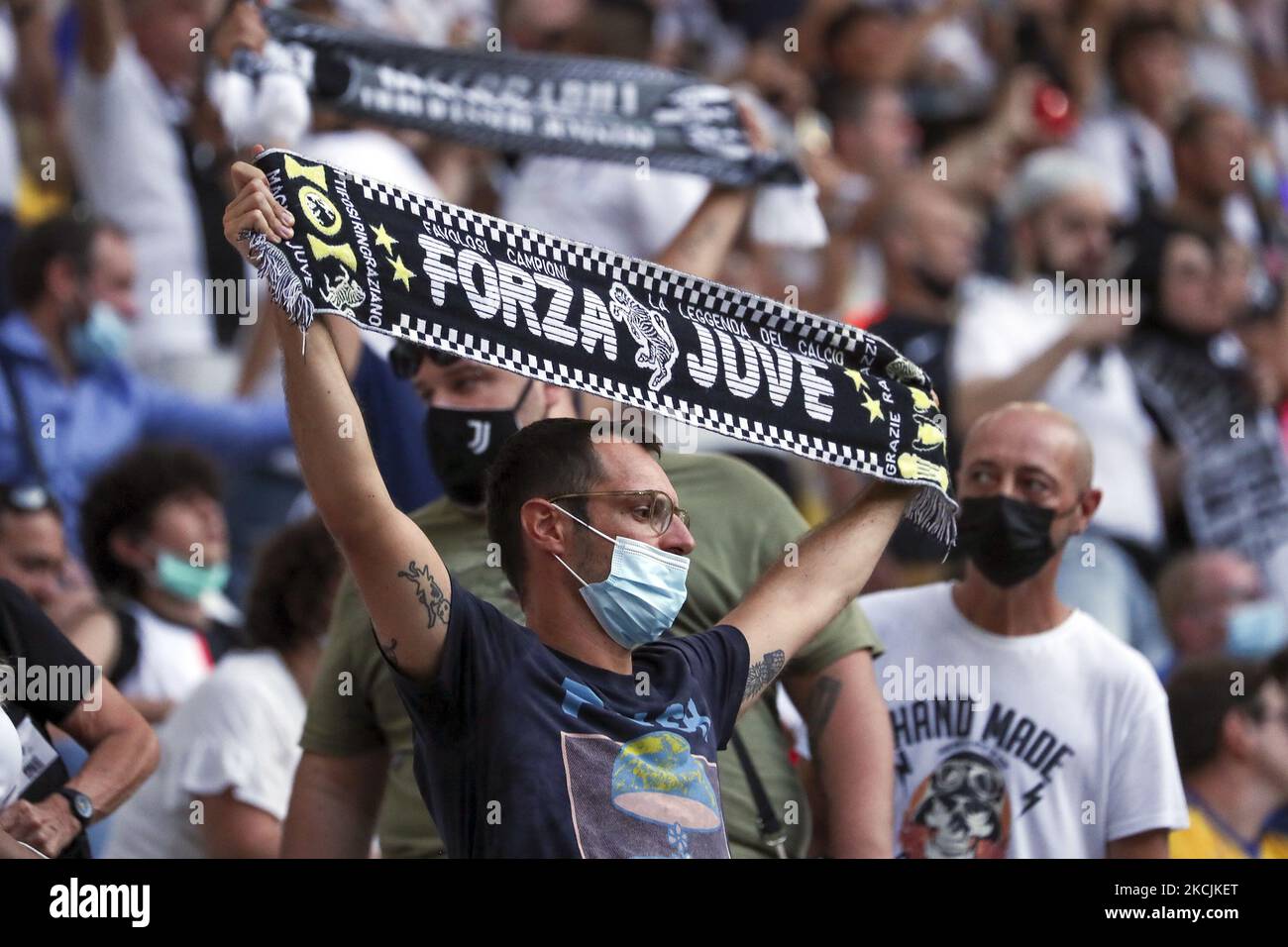 Juventus fans attend the pre-season friendly match between Juventus and ...