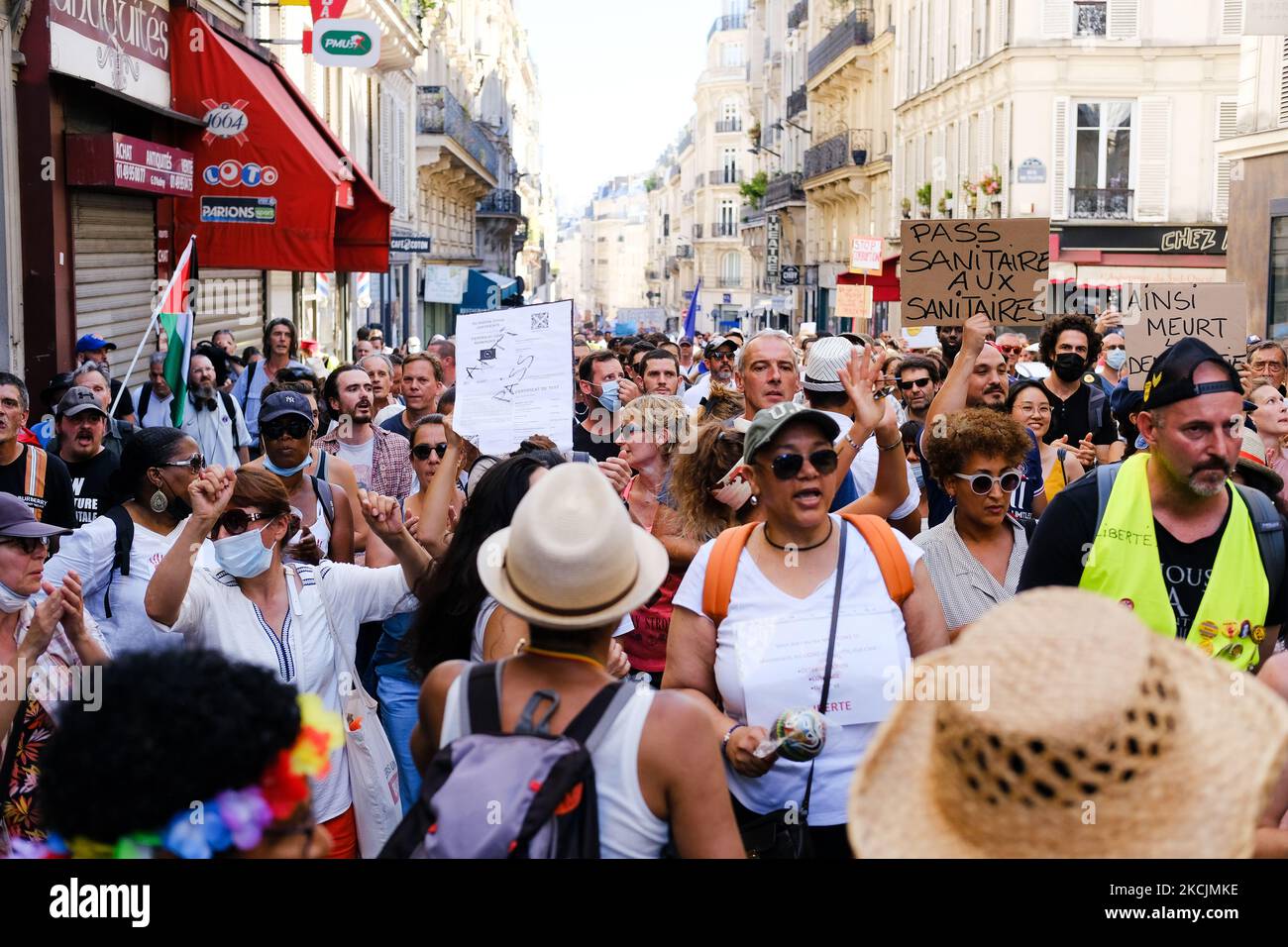Fifth Saturday of demonstrations for opponents of the health pass in Paris, France, on August 14, 2021. More than two hundred events throughout France, while since Monday new places (bars, restaurants, cafes) are affected by the use of the health pass. (Photo by Vincent Koebel/NurPhoto) Stock Photo