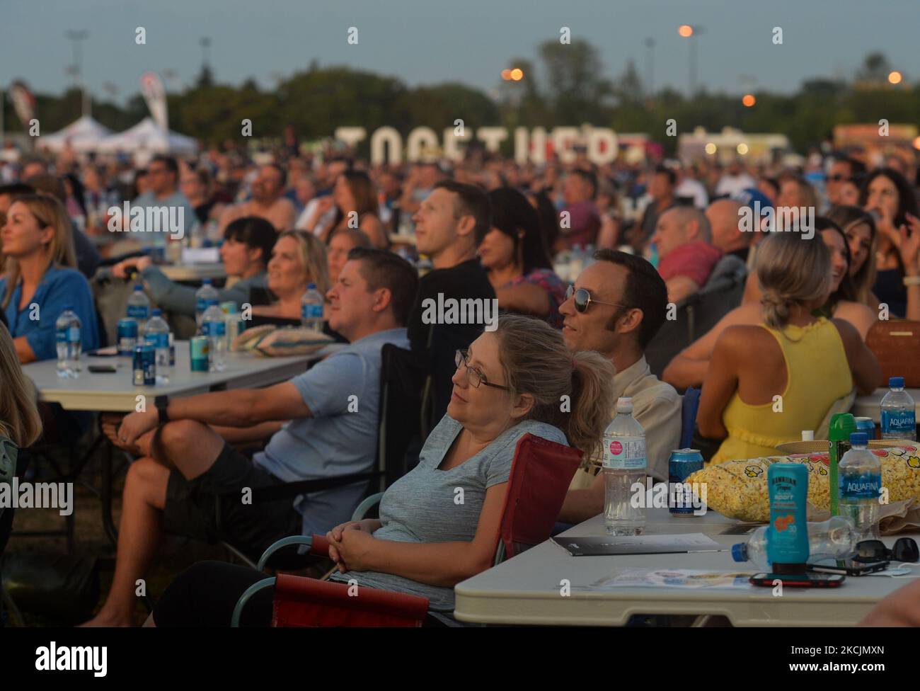 Members of the public waching the show during the Great Outdoor Comedy Festival, a part of the