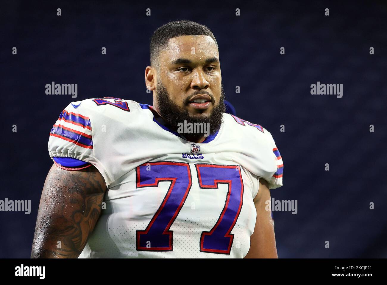 Buffalo Bills offensive lineman Jamil Douglas (77) walks off the field  after a Bills win of an NFL preseason football game between the Detroit  Lions and the Buffalo Bills in Detroit, Michigan