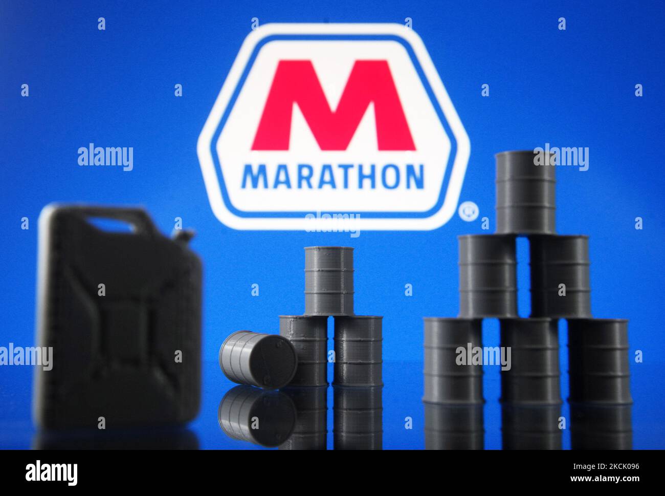 Marathon Petroleum Corporation logo and models of a fuel ?an and oil