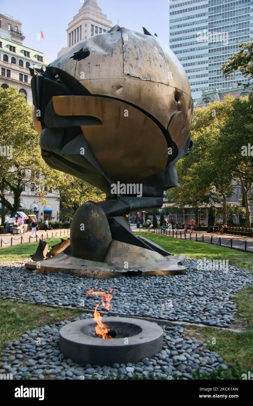 The Memorial Sphere from the World Trade Center in New York, USA. The sphere is a twenty two ton bronze sculpture that was recovered from the rubble of the World Trade Center. The sphere was placed near the Bowling Green entrance to commemorate the tragic events of September 11th. The original position of the sphere was at the base of the World Trade Center's two towers. (Photo by Creative Touch Imaging Ltd./NurPhoto) Stock Photo
