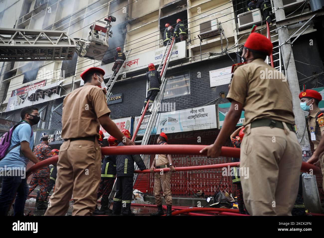 Firefighter work at a scene of a fire incident that broke out at a